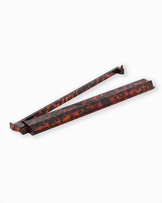 Tortoise Shell Rack & Pusher.