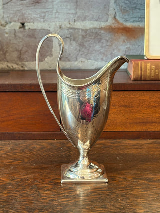 George III Sterling Engraved Cream Jug.