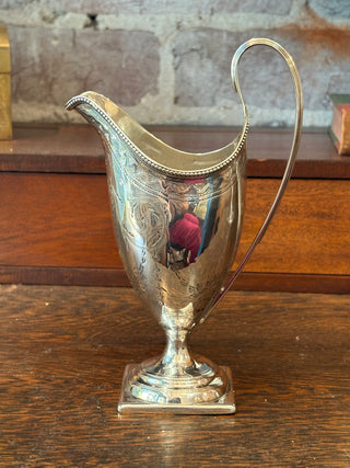 George III Sterling Engraved Cream Jug.