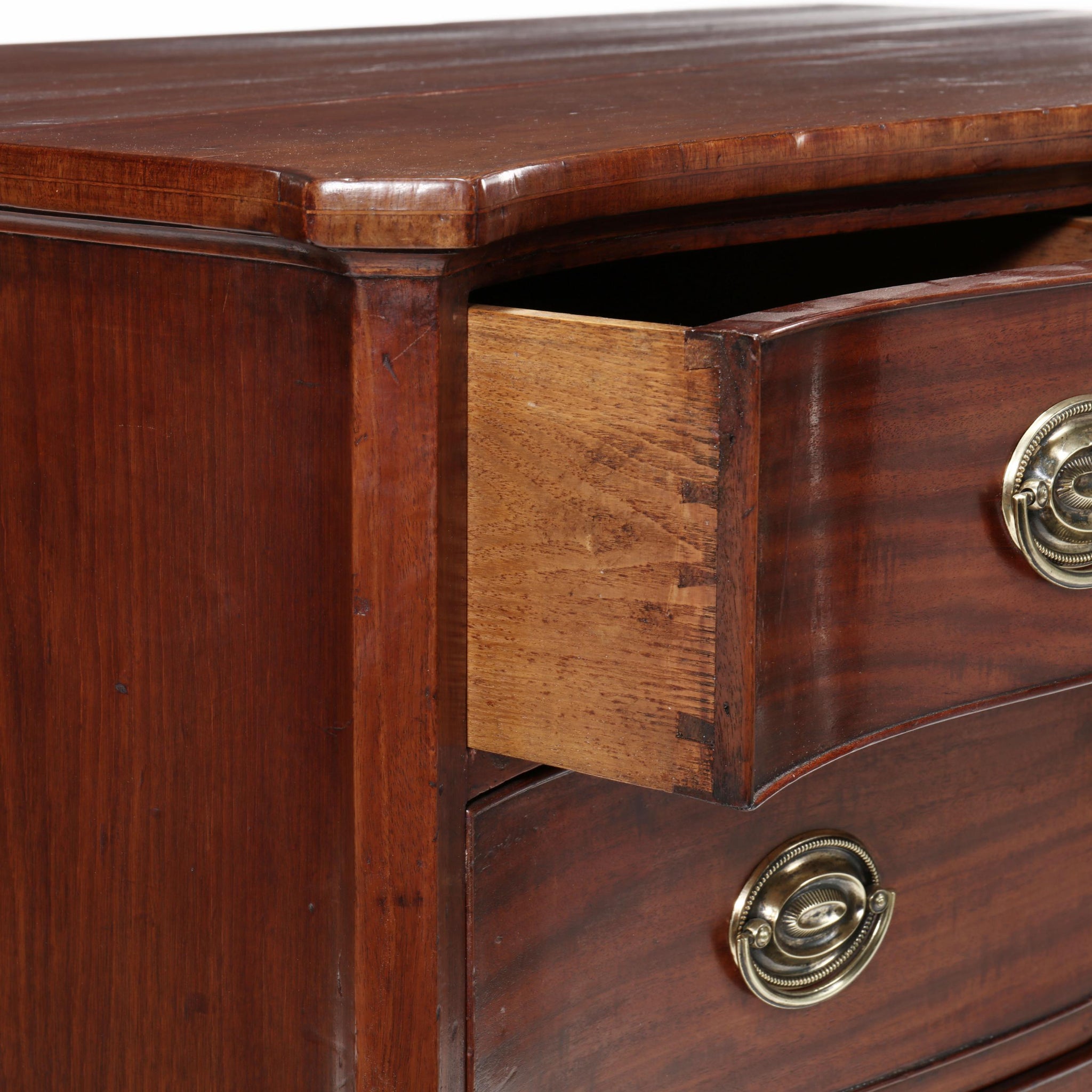 Bonhams : George III mahogany and goncalo alves banded serpentine chest in  the manner Henry Kettle